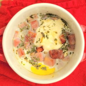 Oeuf en cocotte met ham en dragon