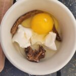 Oeuf en cocotte met porcini en platte peterselie